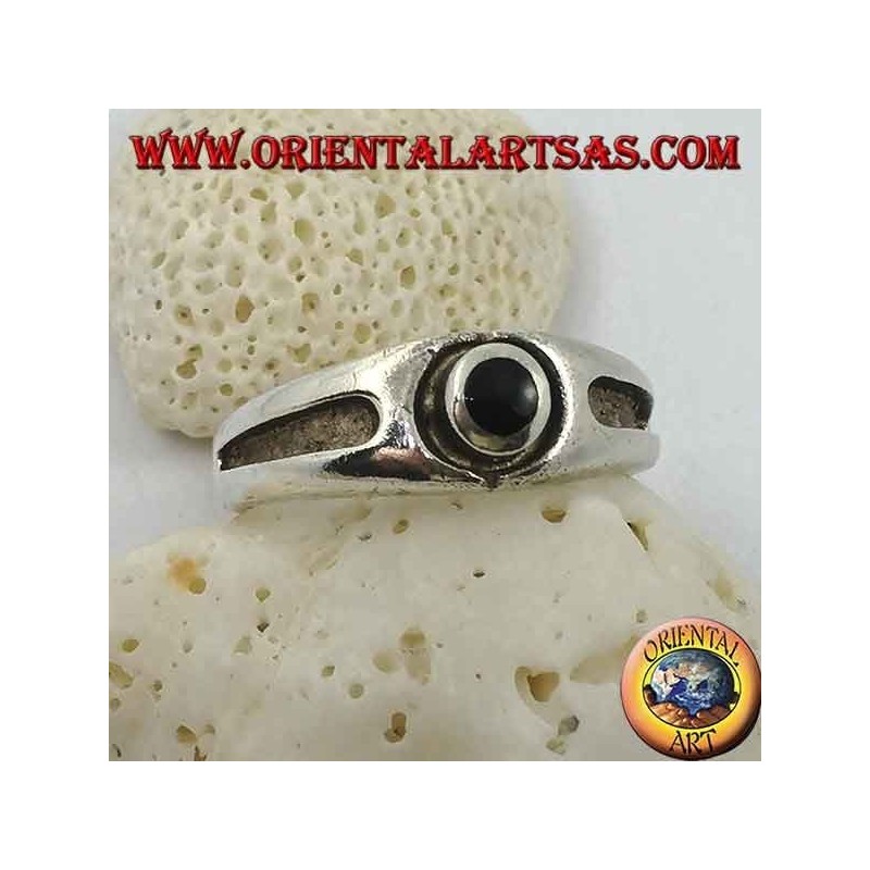 Silver ring with round onyx and thick bas-relief line on the sides