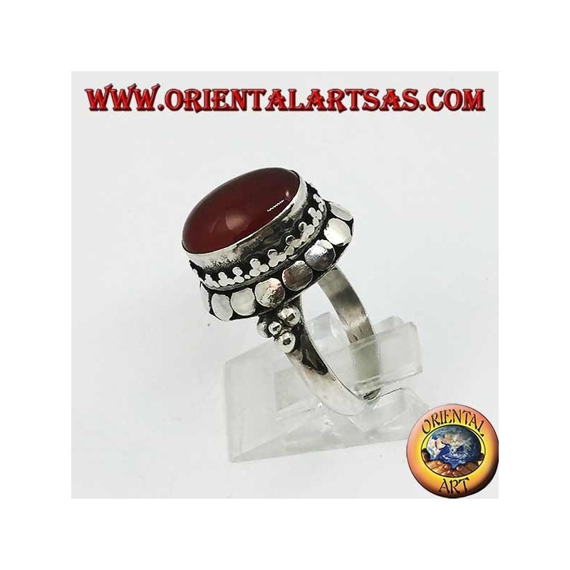 Silver ring with high edge with oval cabochon carnelian