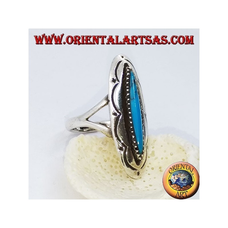 Elongated oval silver ring with shuttle turquoise and engraved decorations