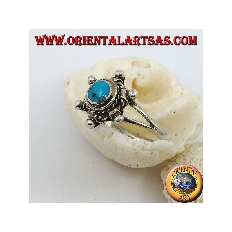 Bague en argent en forme de gouvernail avec turquoise ronde