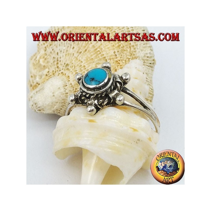 Anello in argento a forma di timone con turchese tondo
