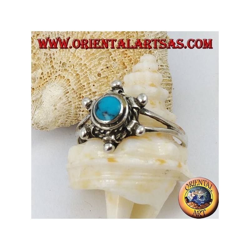 Anello in argento a forma di timone con turchese tondo