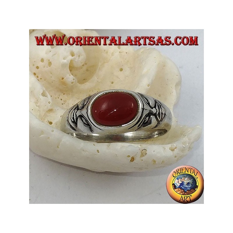 Silver ring with horizontal oval carnelian and tragedy masks on the sides