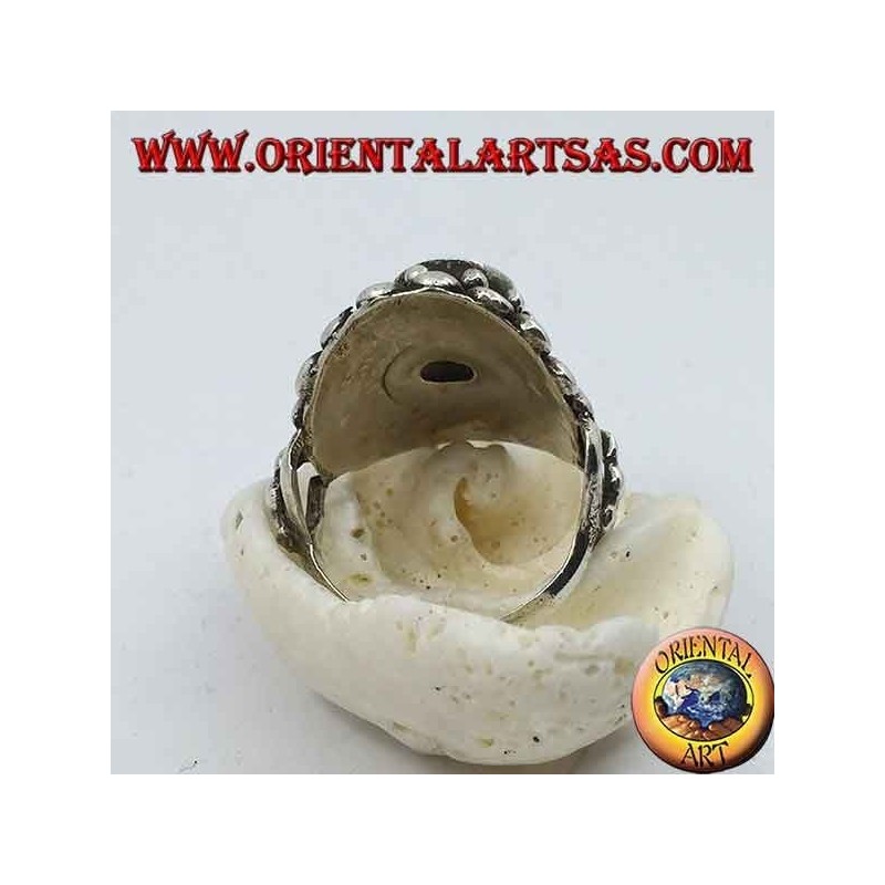 Anello in argento con ametista ovale naturale su montatura in stile nepalese con dischetti e intrecci