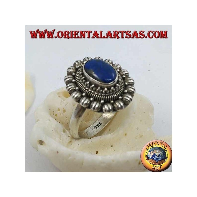 Silver flower ring with oval cabochon lapis lazuli