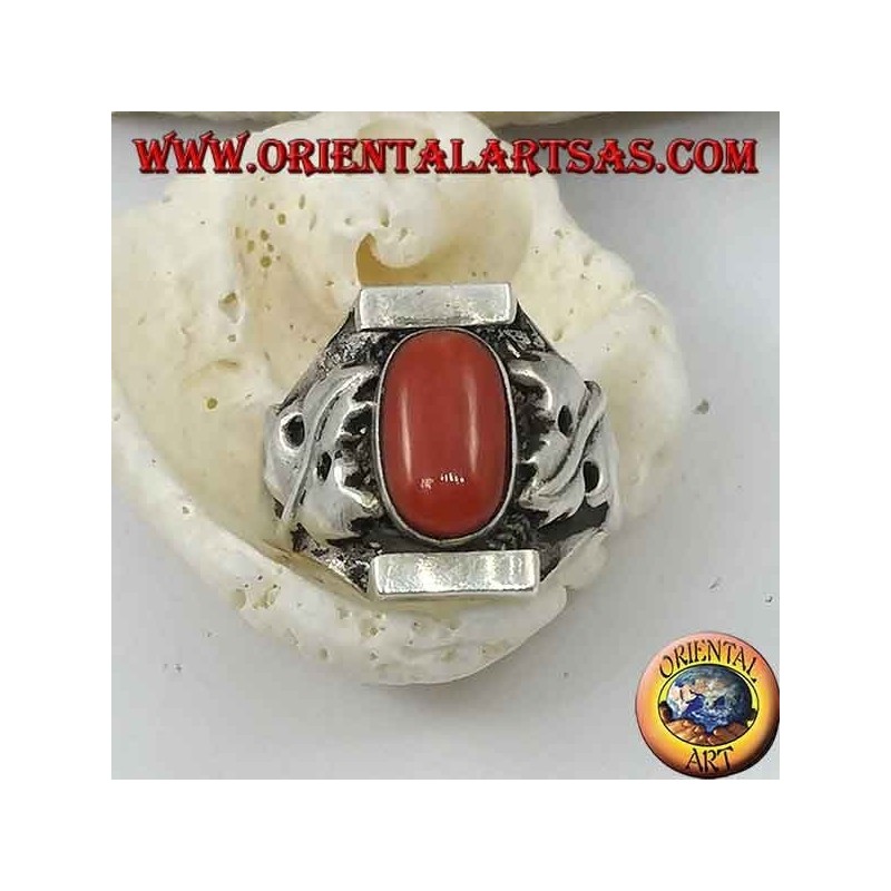 Silver ring with antique Tibetan oval coral and Nepalese setting with bay leaves on the sides