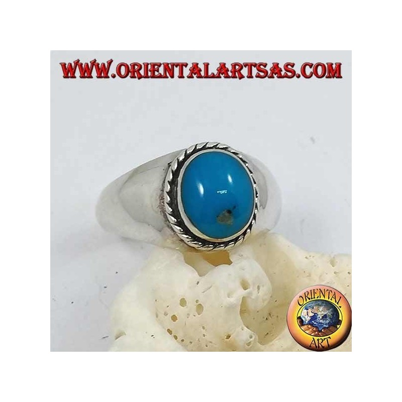 Bague en argent avec un cabochon ovale turquoise entouré d'une tresse