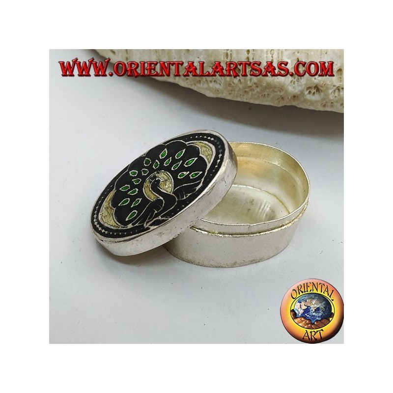 Silver ellipsoid box chiseled and fire enamelled with peacock (green)
