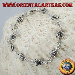 Soft silver bracelet with sun with engraved face