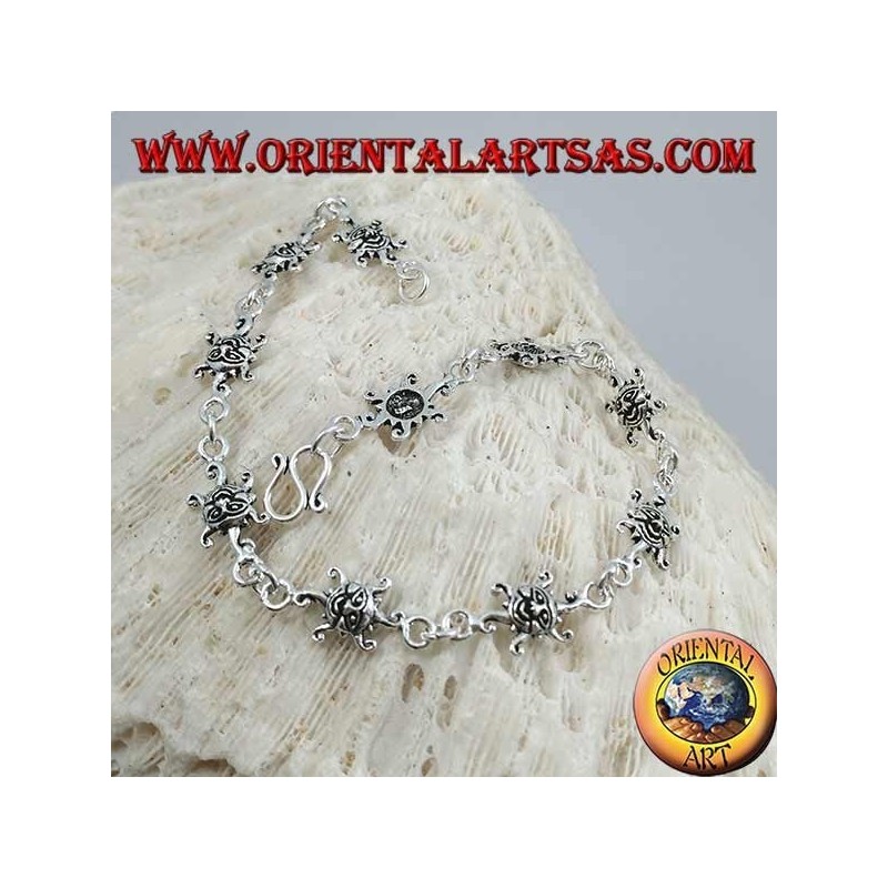 Soft silver bracelet with sun with engraved face