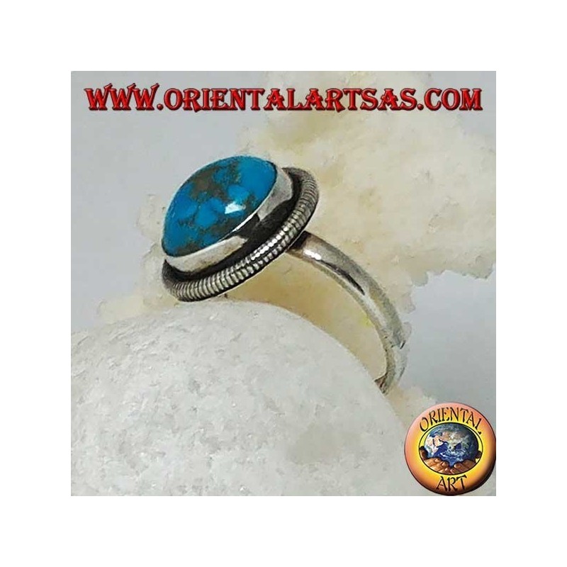 Bague en argent avec un cabochon rond turquoise entouré d'une rangée de disques (16)