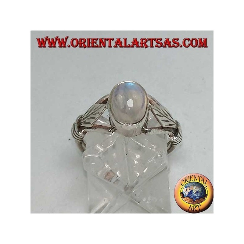 Silver ring with oval rainbow moonstone and rhomboid leaf with discs on the sides
