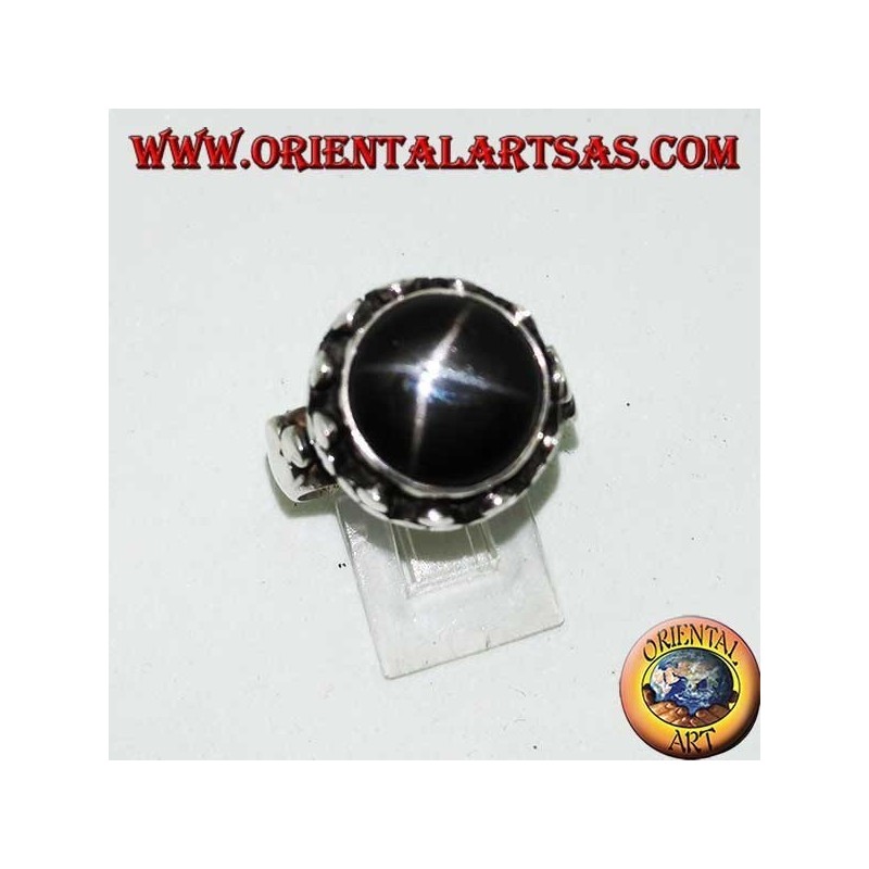 Silver ring with raised Black Star surrounded by disc clovers