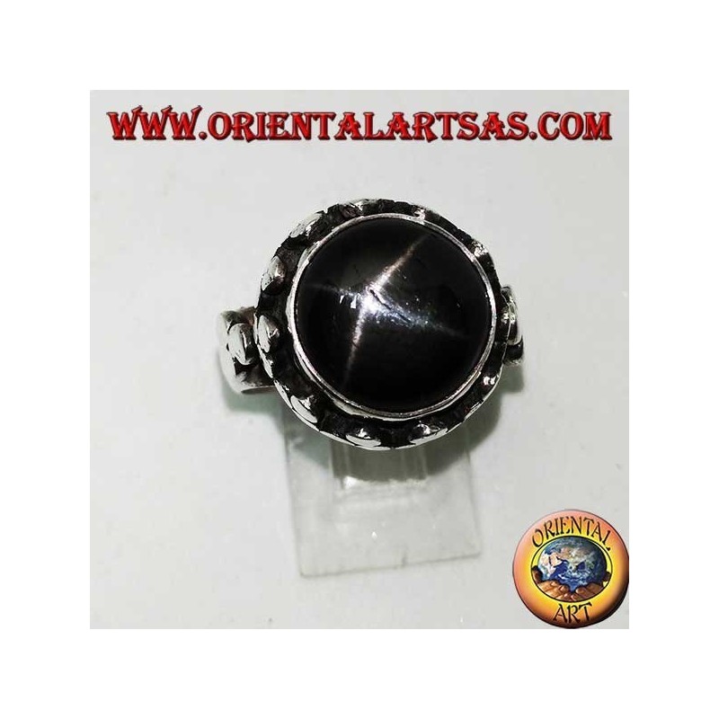 Silver ring with raised Black Star surrounded by disc clovers