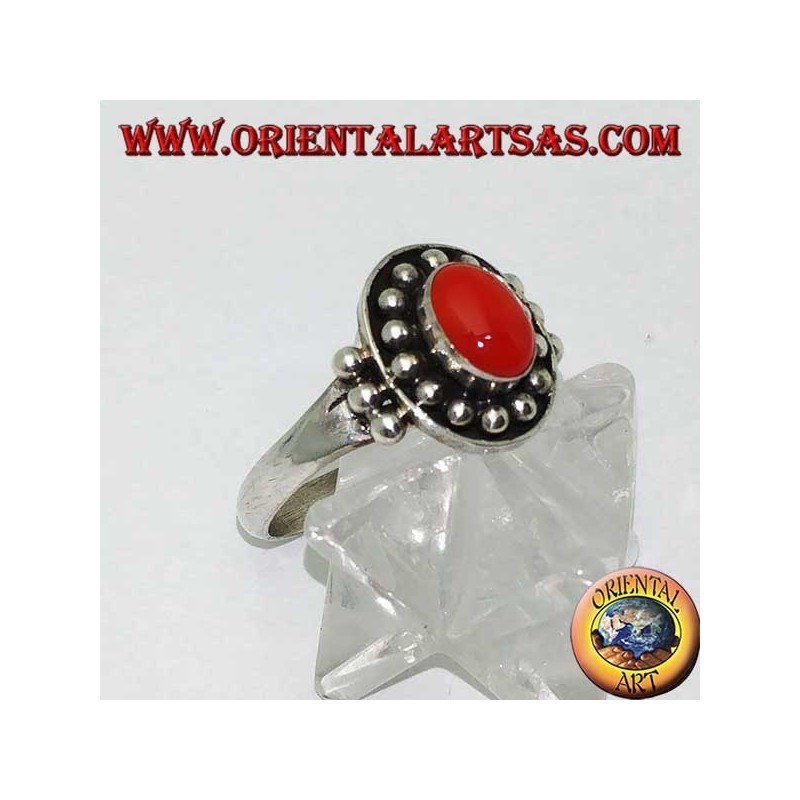 Oval cabochon carnelian silver ring on a high relief ball crown