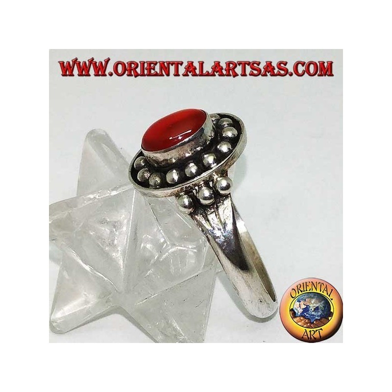 Oval cabochon carnelian silver ring on a high relief ball crown