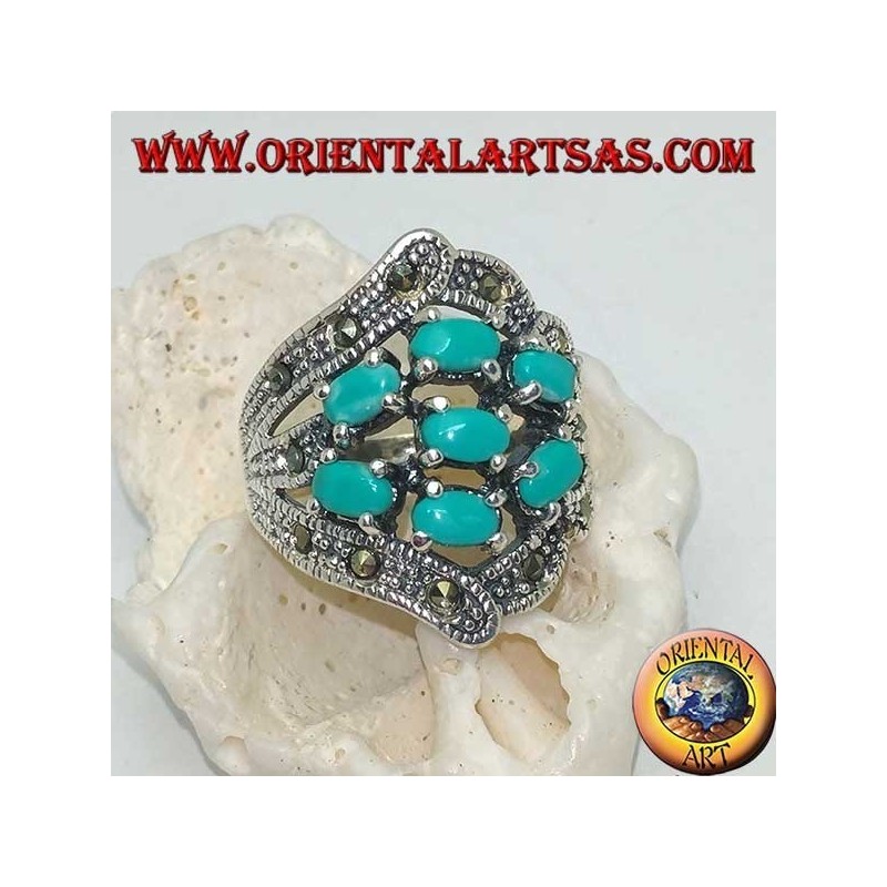 Anello in argento con sette turchesi ovali incastonati e marcassite