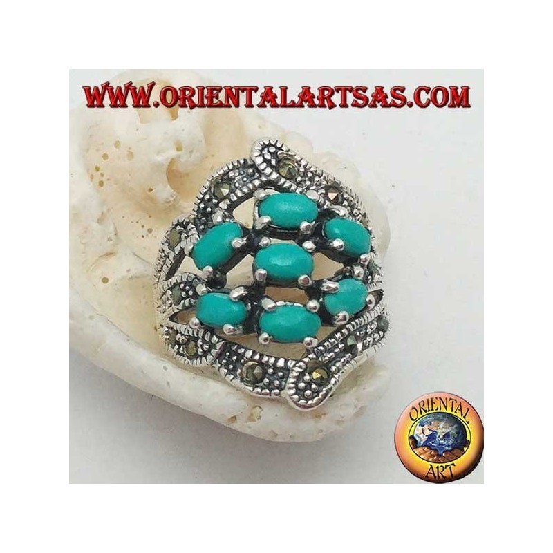 Anello in argento con sette turchesi ovali incastonati e marcassite