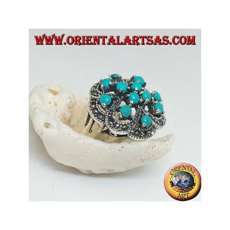 Anello in argento a doppia croce alternate traforato con turchesi tondi incastonati e marcassite