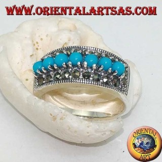 Bague en argent avec une rangée de boules turquoise entourée de marcassite