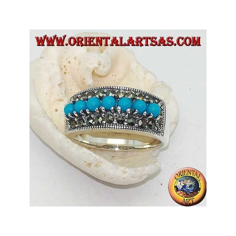Anello in argento a fascia con una fila di turchesi a palline incastonate contornata da marcasite