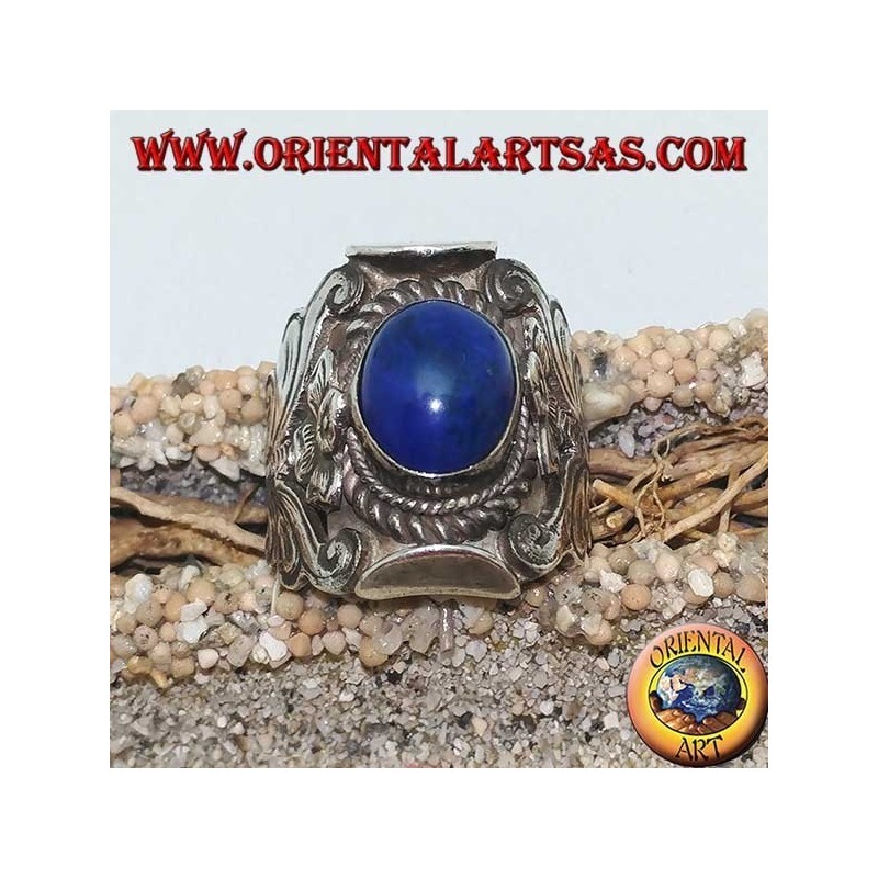 Silver ring with oval cabochon lapis lazuli and Nepalese setting with flower on the sides