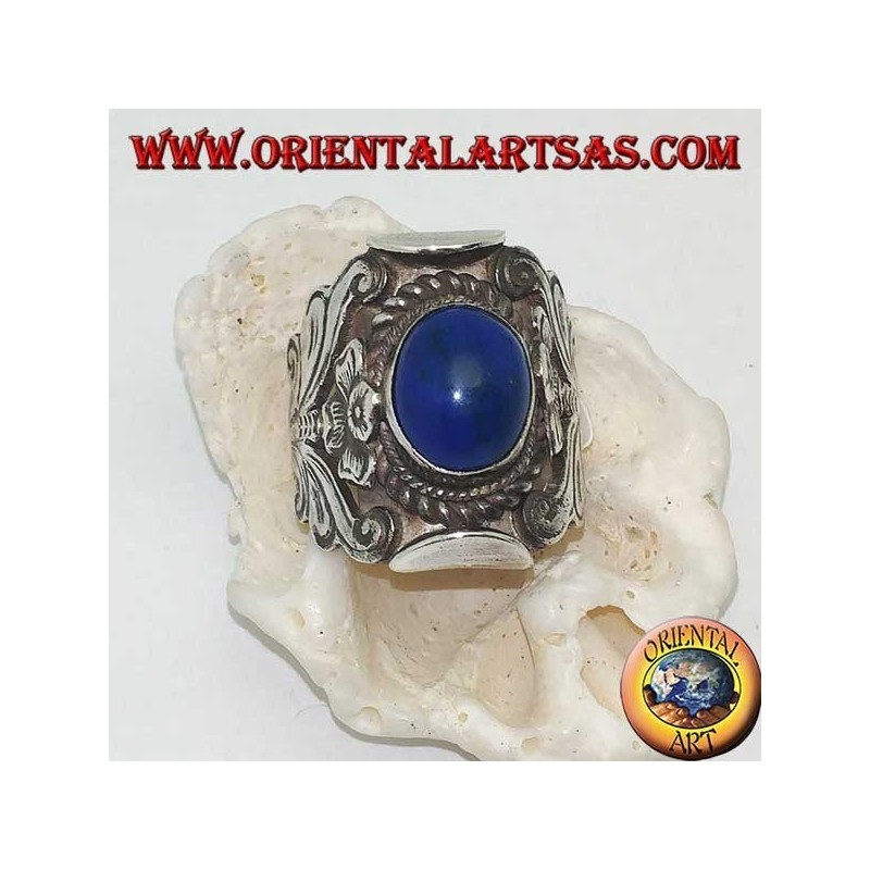 Silver ring with oval cabochon lapis lazuli and Nepalese setting with flower on the sides