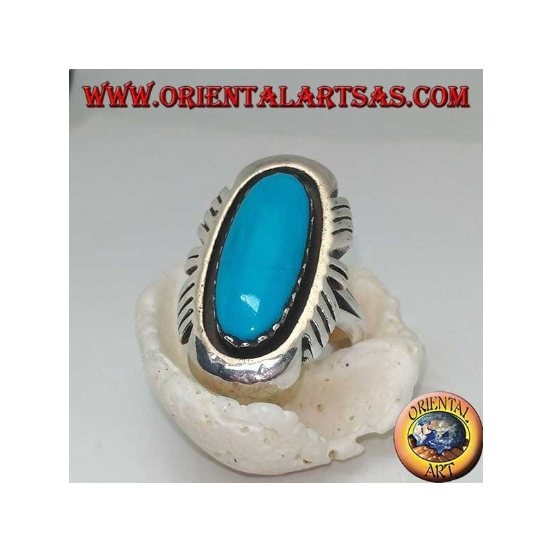 Silver ring with elongated oval turquoise on a smooth frame ruled on the sides