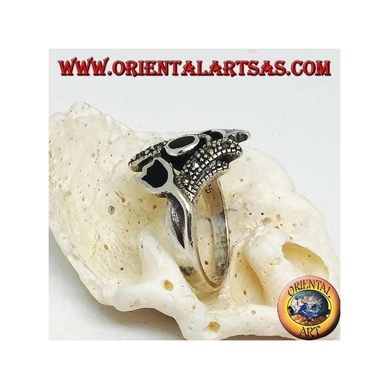 Silver ring with oval onyx between two onyx tulips and stems with marcasites