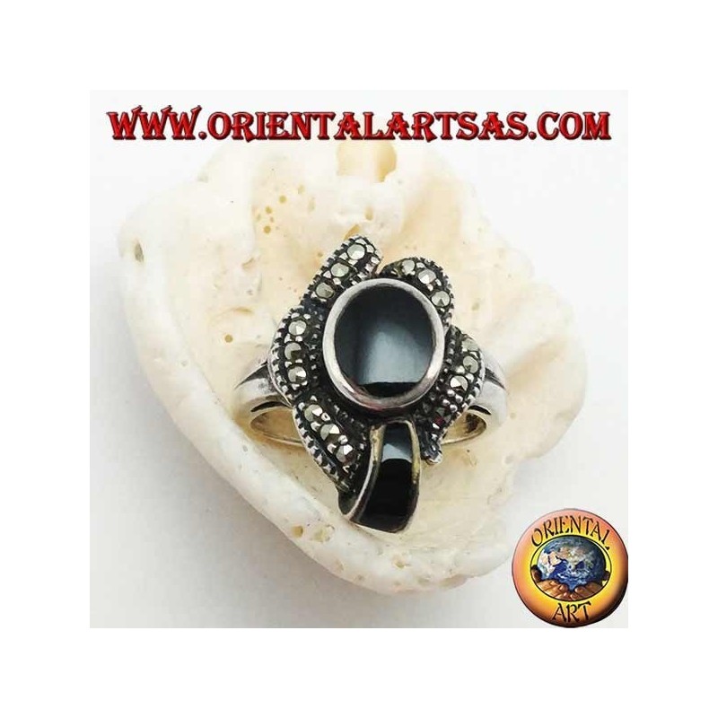Silver ring with oval onyx surrounded by marcasites and an onyx band