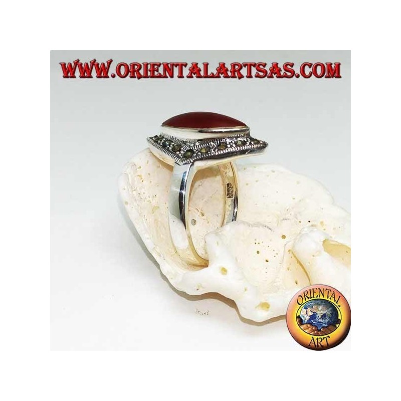 Rhomboidal silver ring with shuttle carnelian surrounded by a row of marcasite