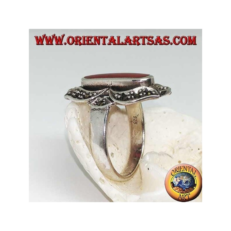 Silver ring with oval carnelian lengthened in a marcasite eight