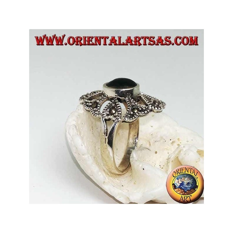 Silver ring with oval green agate on an openwork setting with marcasites
