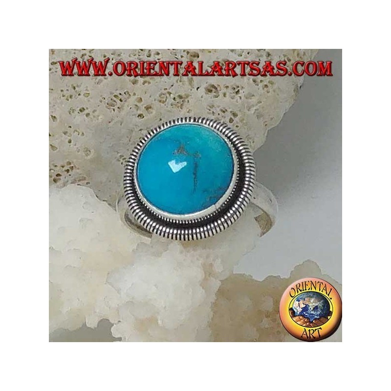Bague en argent avec un cabochon rond turquoise entouré d'une rangée de disques (14)