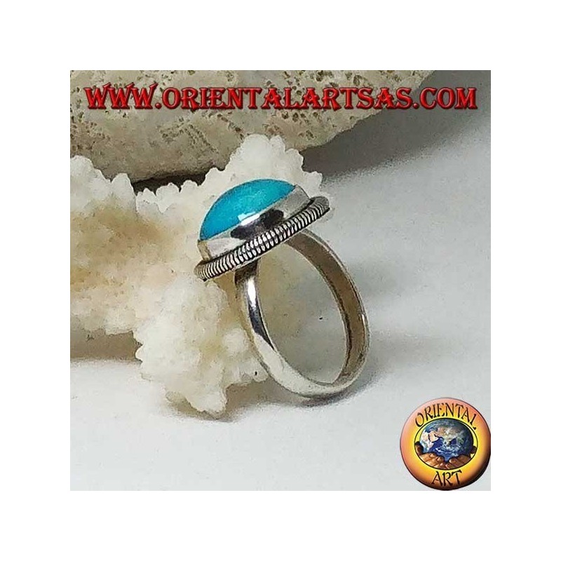 Silver ring with a round cabochon turquoise surrounded by a row of disks (14)