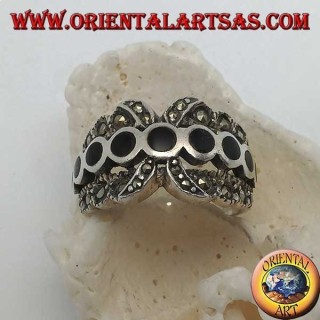 X-band silver ring with a row of round onyx discs between marcasite