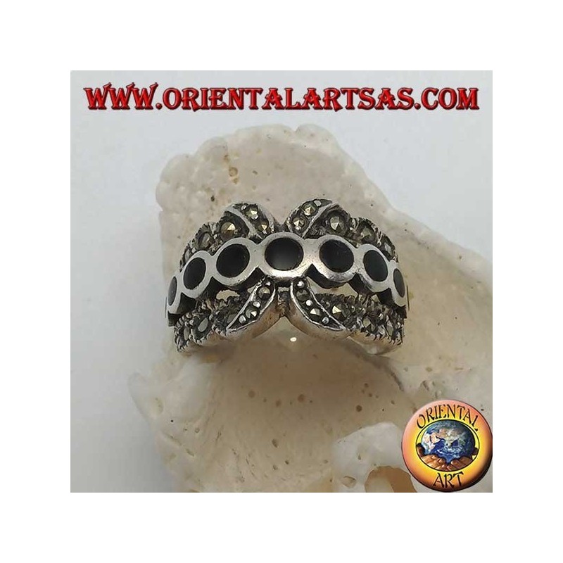 X-band silver ring with a row of round onyx discs between marcasite
