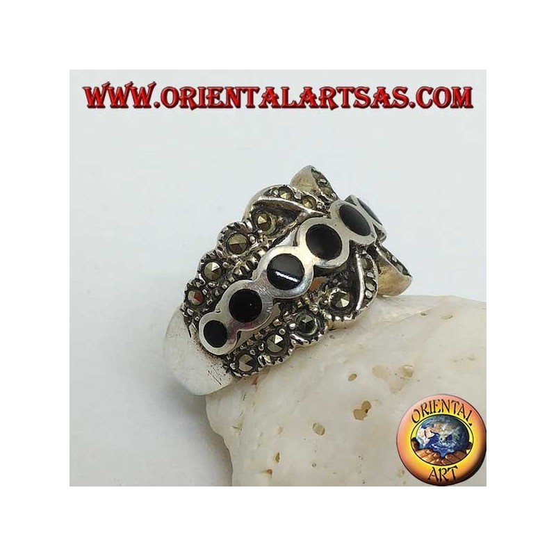 X-band silver ring with a row of round onyx discs between marcasite