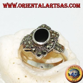 Silver ring with oval onyx surrounded by marcasite with an oblique band