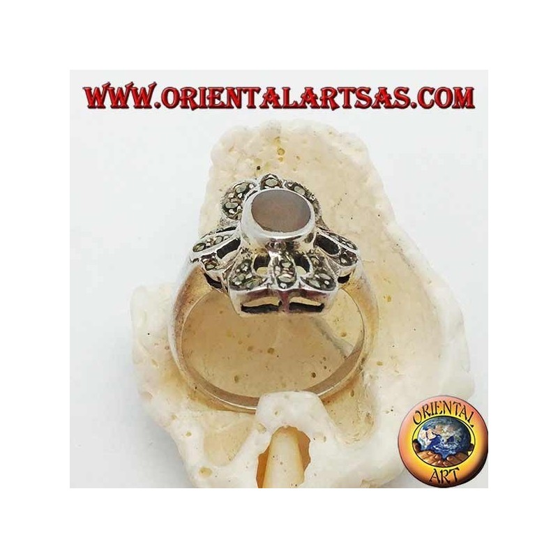 Silver ring with oval agate surrounded by a triple line cross pierced with marcasite