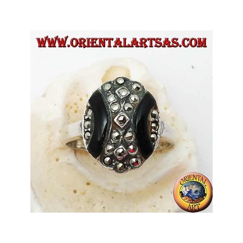 Oval silver ring with curved bands of onyx and marcasite