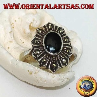 Silver flower ring with oval onyx and ten marcasite petals