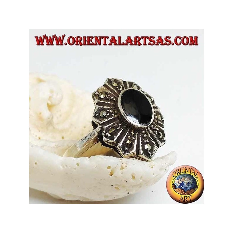 Silver flower ring with oval onyx and ten marcasite petals