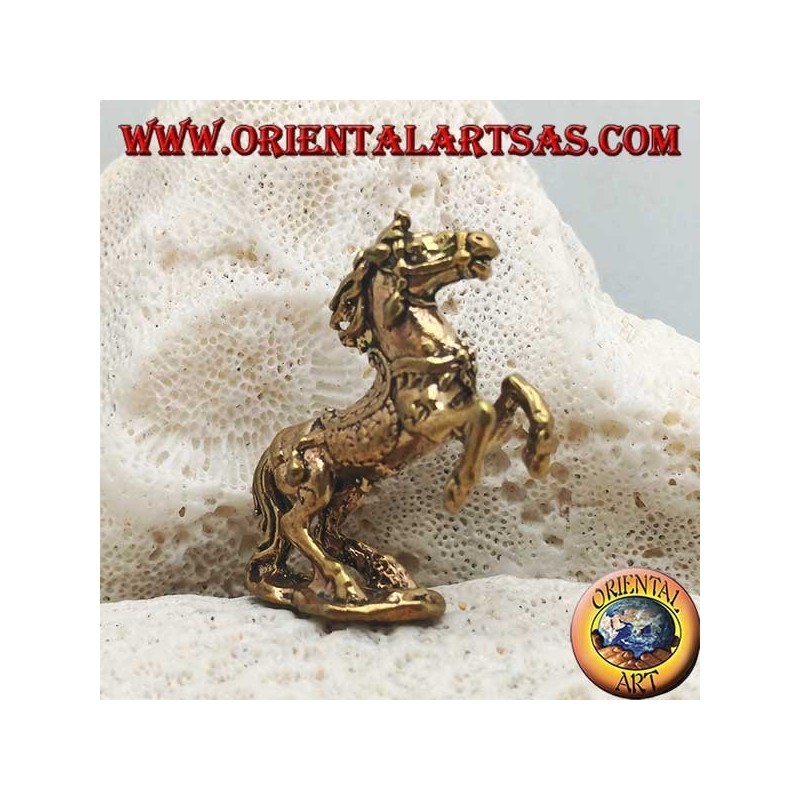 Rampant horse sculpture with saddle and reins decorated in brass (small)