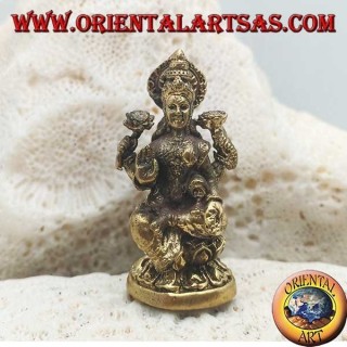 Escultura de Buda "Varada Mudra - símbolo de ofrenda, bienvenida, caridad" con halo de latón (pequeño)