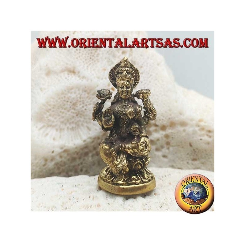 Escultura de Buda "Varada Mudra - símbolo de ofrenda, bienvenida, caridad" con halo de latón (pequeño)