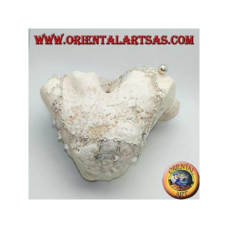 Tobillera plateada con estrellas y lunas colgantes alternas y una pequeña campana