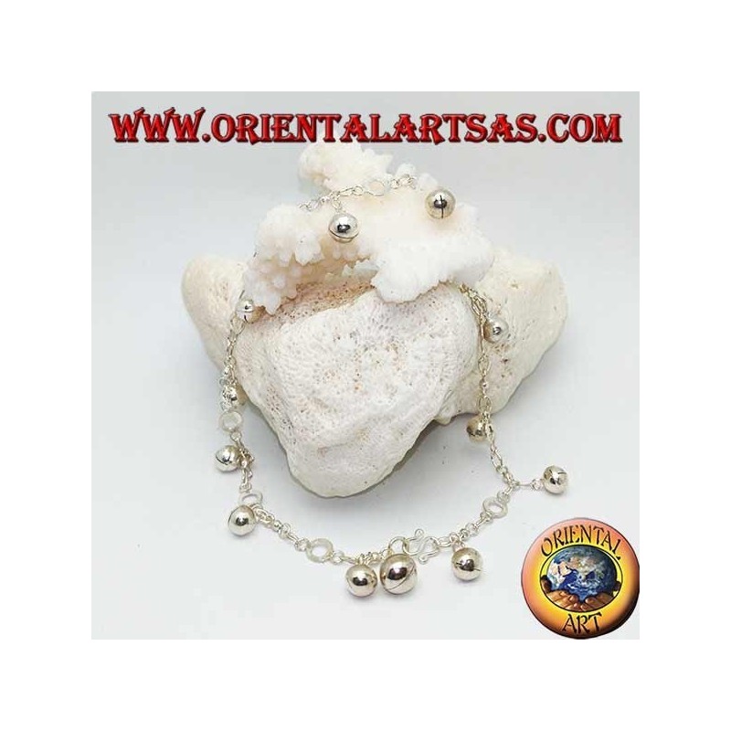 Silver anklet with hanging bells and alternating discs