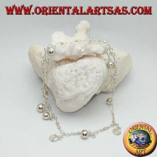 Bracelet de cheville en argent avec alternance de spirales et de cloches suspendues