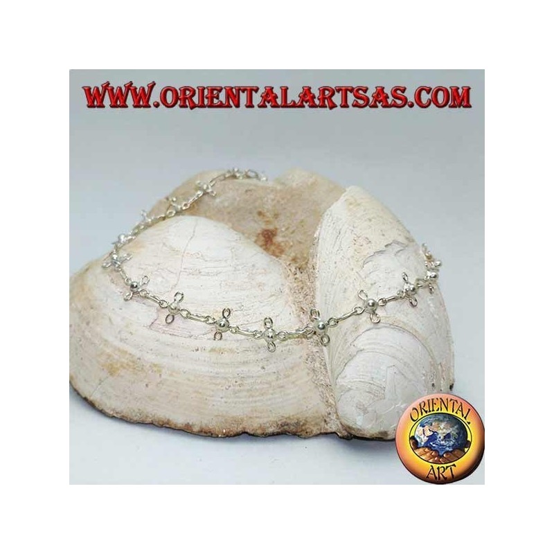 Bracelet de cheville en argent avec trèfles à quatre feuilles stylisés et cloche